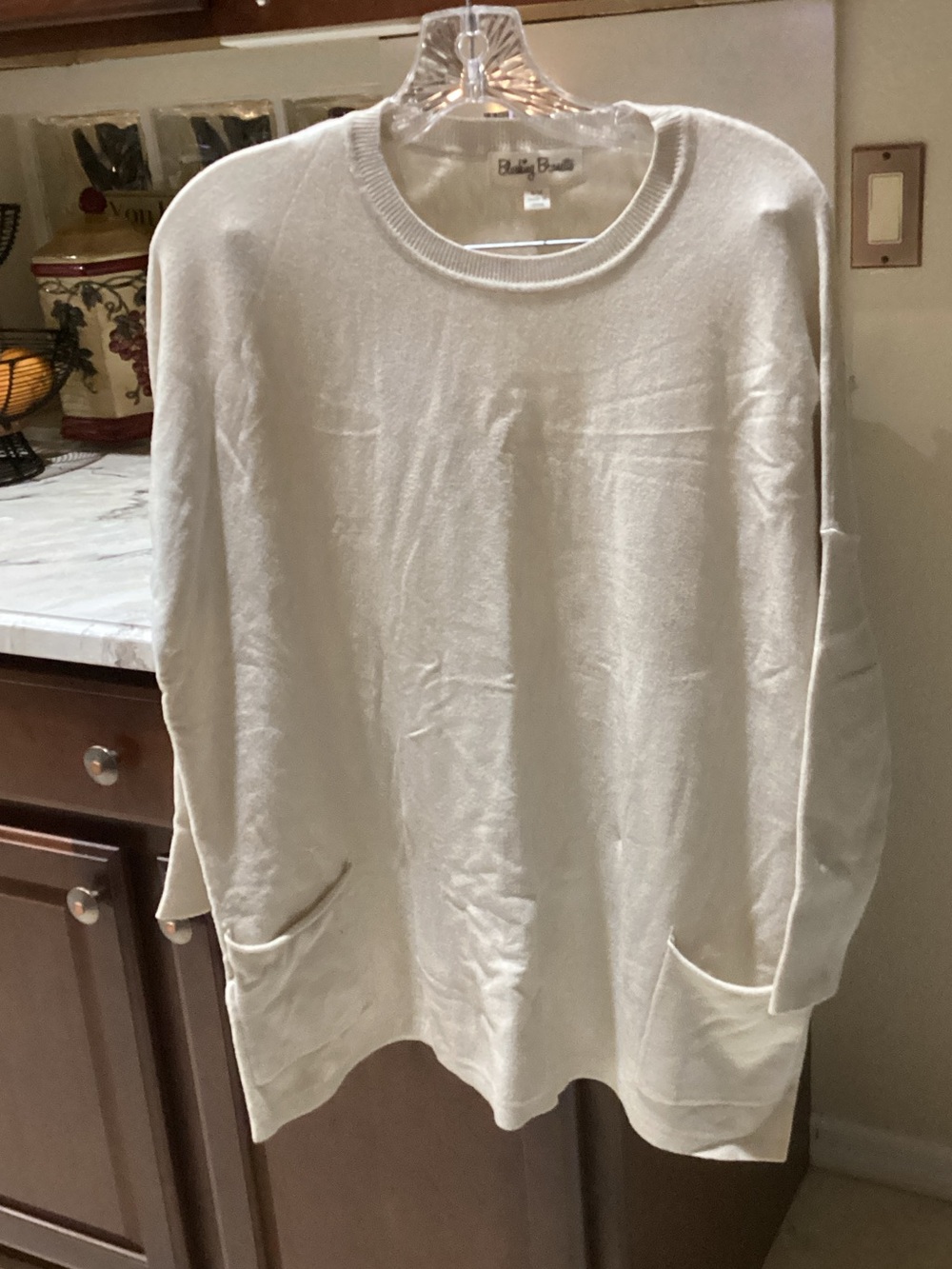Cozy Ivory Crewneck Sweater with Front Pockets - Shabby Chic